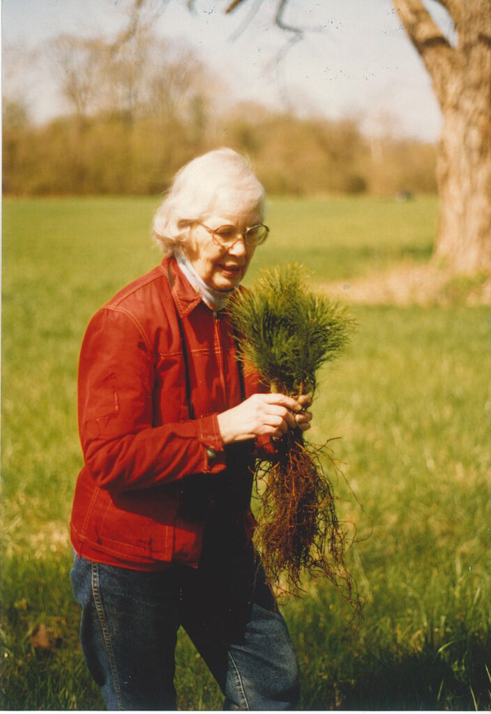 Charlotte Gallant with tree saplings