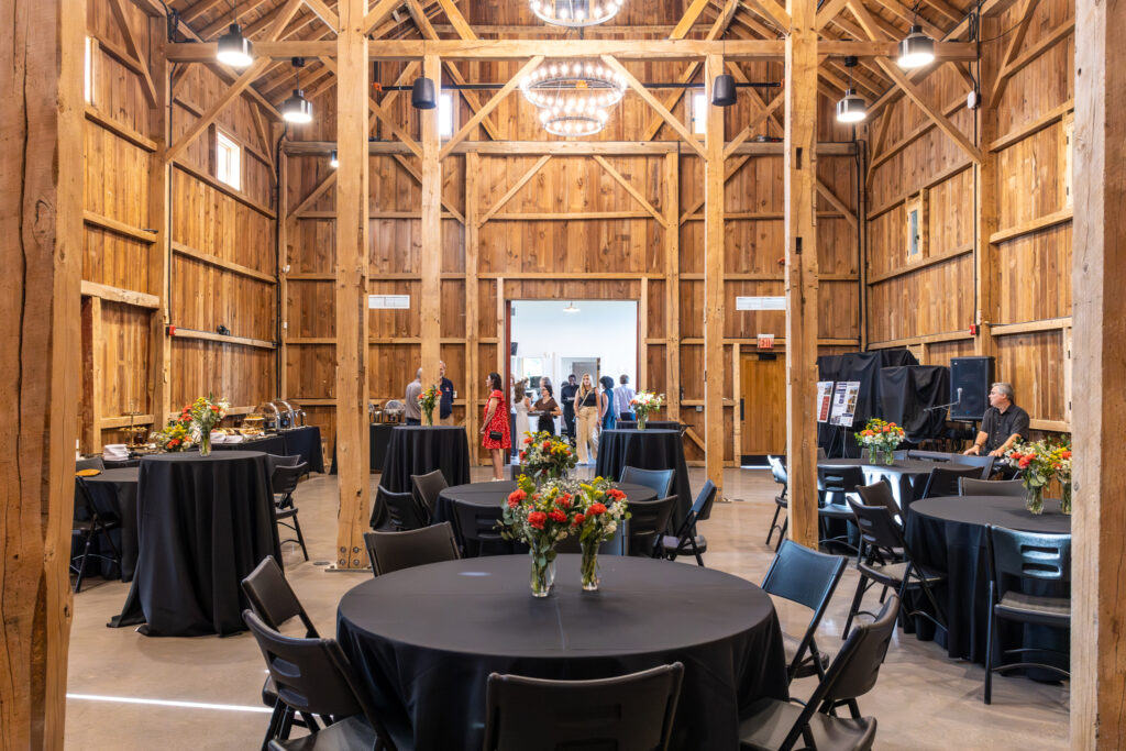 event hall set up with round tables and chairs